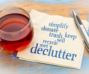 Downsizing Apartment Cleanout or Hurrican Season- a napkin reminding you to declutter
