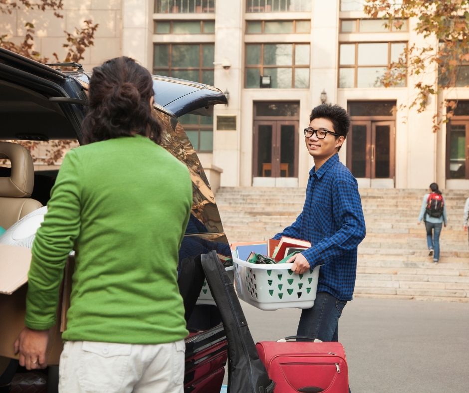 College Moving Day- a boy moving in or out