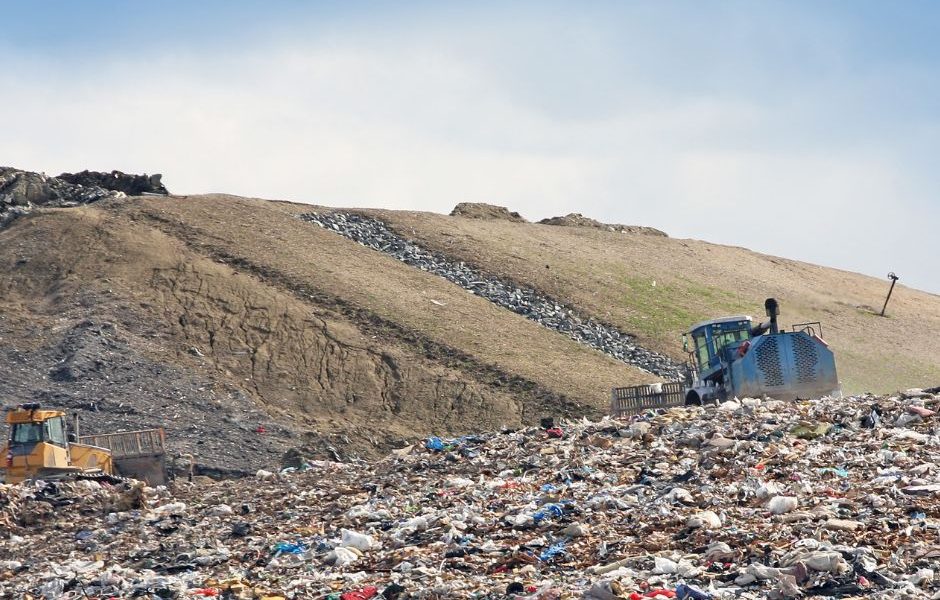 Image of a filled landfill.