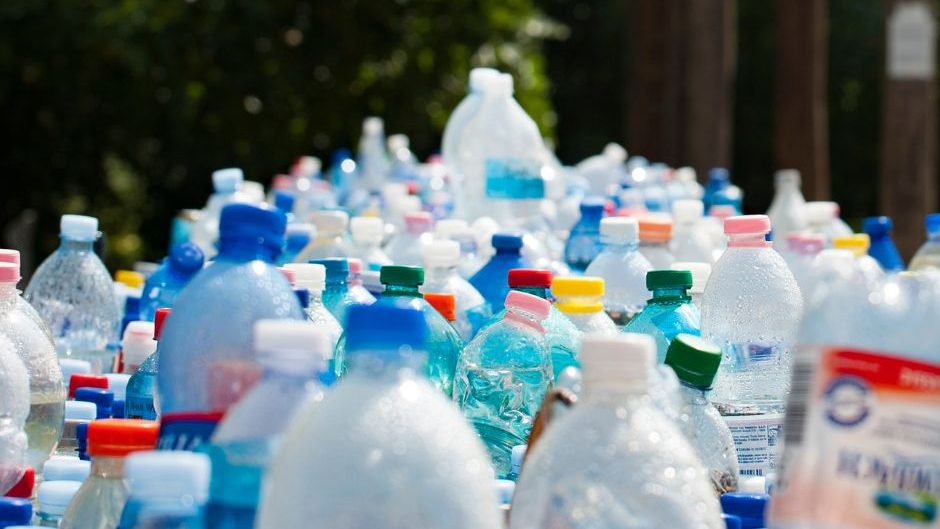 Green team bulk trash removal- stack of water bottles